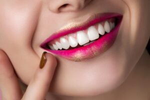 woman showing her new dental implants