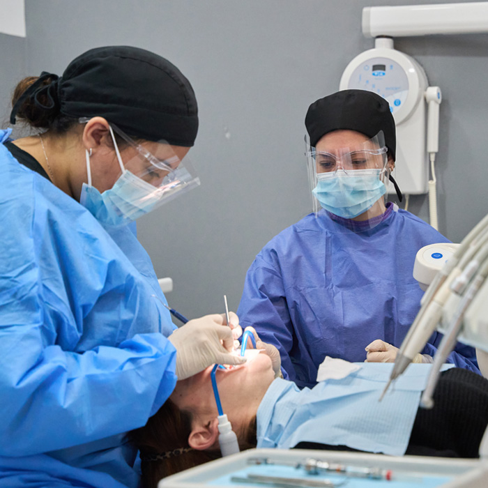 dentist performing dental crown procedure in fsj